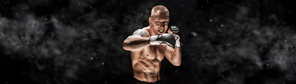 Closeup of UFC fighter with gloves on.